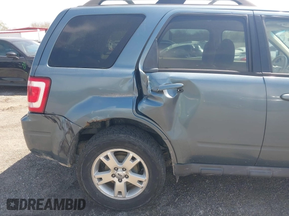 2011 Ford Escape Limited with VIN 1FMCU9EG1BKB19982, listed as a IAAI auction lot 42053239 with 247,669 mi miles. Bid and sale history available at carsss.com. Image 6.