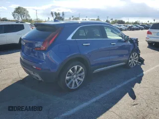 2023 Cadillac XT4 AWD Premium Luxury z VIN 1GYFZDR44PF206176, wystawiony jako Copart lot #46456445 z przebiegiem 3 896 mil mil oraz Szkoda całkowita • Salvage title. Historia ofert i sprzedaży dostępna na DreamBid. Obrazek 3.