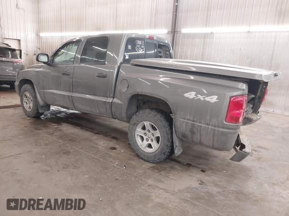 2007 Dodge Dakota SLT z VIN 1D7HW48J17S138642, wystawiony jako IAAI lot #41419794 z przebiegiem 79 350 mil mil oraz . Historia ofert i sprzedaży dostępna na DreamBid. Obrazek 3.