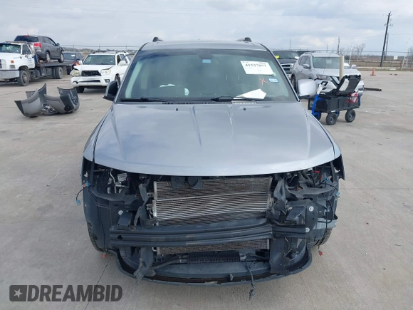 2018 Dodge Journey Crossroad with VIN 3C4PDDGG6JT387090, listed as a IAAI auction lot 41527077 with 71,637 mi miles and . Bid and sale history available at DreamBid. Image 12.