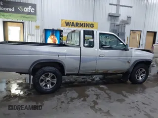 1996 Nissan Frontier XE with VIN 1N6SD16Y6TC318642, listed as a IAAI auction lot 41529283 with 154,632 mi miles and . Bid and sale history available at DreamBid. Image 13.
