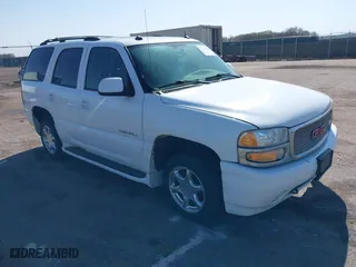 2004 GMC Yukon Denali with VIN 1GKEK63U54J251781, listed as a IAAI auction lot 42099768 with 166,543 mi miles. Bid and sale history available at carsss.com. Image 1.