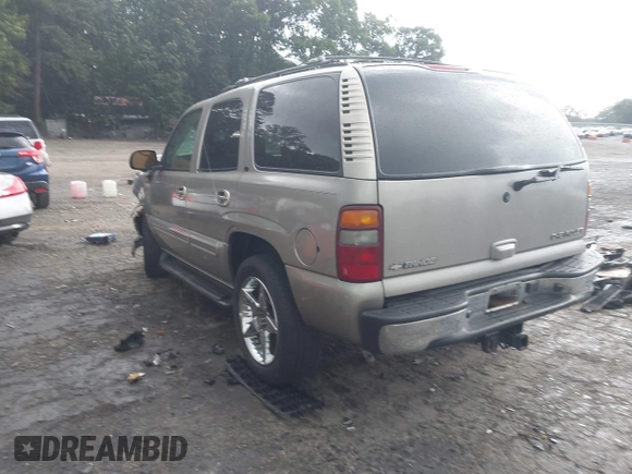 2002 Chevrolet Tahoe LT with VIN 1GNEC13Z62J233110, listed as a IAAI auction lot 42460607 with 329,196 mi miles and . Bid and sale history available at DreamBid. Image 3.