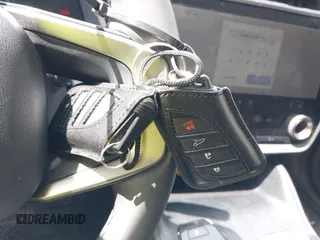 2024 Lexus RZ 450e Premium z VIN JTJAAAABXRA023751, wystawiony jako IAAI lot #42082320 z przebiegiem 15 641 mil mil oraz . Historia ofert i sprzedaży dostępna na DreamBid. Obrazek 11.