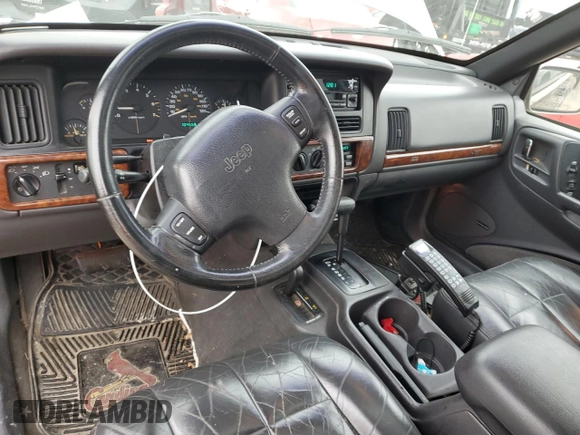1997 Jeep Grand Cherokee Limited with VIN 1J4GZ78Y3VC568413, listed as a Copart auction lot 86171124 with 104,558 mi miles and Salvage Title. Bid and sale history available at carsss.com. Image 8.