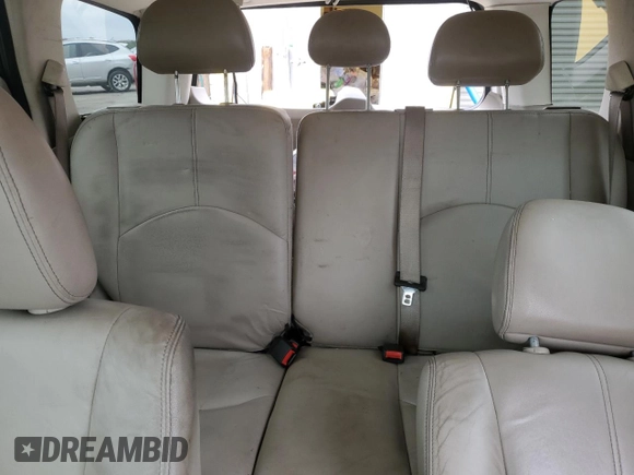 2009 Mercury Mariner Premier with VIN 4M2CU87G79KJ03236, listed as a Copart auction lot 84059324 with 130,335 mi miles and Salvage title. Bid and sale history available at DreamBid. Image 10.
