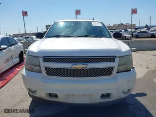 2008 Chevrolet Suburban LTZ with VIN 1GNFC16058R198040, listed as a IAAI auction lot 41421238 with 215,591 mi miles. Bid and sale history available at carsss.com. Image 12.