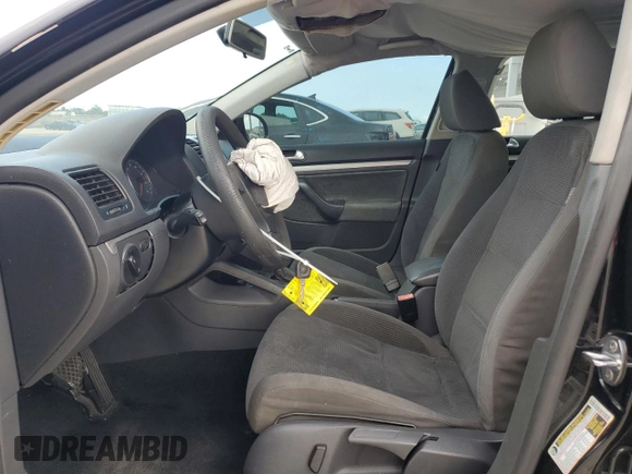 2009 Volkswagen Jetta S z VIN 3VWJM71K49M094862, wystawiony jako Copart lot #51166725 z przebiegiem 121 849 mil mil oraz Szkoda całkowita • Salvage title. Historia ofert i sprzedaży dostępna na DreamBid. Obrazek 7.