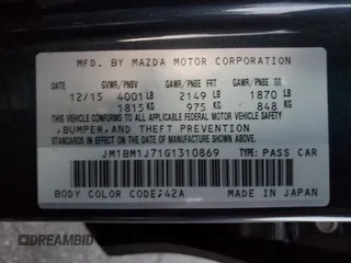 2016 Mazda 3 i Sport with VIN JM1BM1J71G1310869, listed as a Copart auction lot 86384774 with 98,893 mi miles and Salvage Title. Bid and sale history available at DreamBid. Image 12.