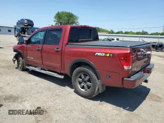 2015 Nissan Titan Pro-4X with VIN 1N6BA0EC5FN506358, listed as a Copart auction lot 56671205 with 153,712 mi miles and Salvage title. Bid and sale history available at DreamBid. Image 2.