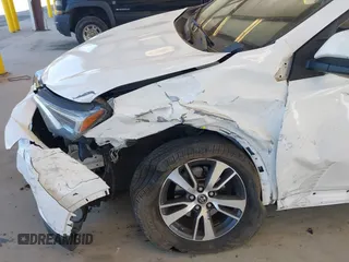 2018 Toyota RAV4 XLE with VIN JTMRFREVXJD240388, listed as a IAAI auction lot 42052065 with 117,114 mi miles. Bid and sale history available at carsss.com. Image 6.