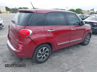 2014 FIAT 500L Lounge with VIN ZFBCFACH1EZ008603, listed as a IAAI auction lot 41583042 with 92,209 mi miles and . Bid and sale history available at DreamBid. Image 4.