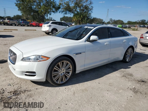 2013 Jaguar XJ Supercharged with VIN SAJWA2GE3DMV45811, listed as a Copart auction lot 76585864 with 53,570 mi miles and Salvage title. Bid and sale history available at DreamBid. Image 1.