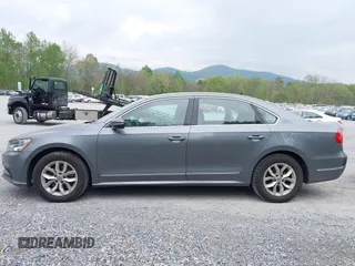 2016 Volkswagen Passat 1.8T S with VIN 1VWAT7A39GC032948, listed as a IAAI auction lot 42127599 with 177,407 mi miles. Bid and sale history available at carsss.com. Image 14.