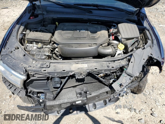 2018 Dodge Durango SXT with VIN 1C4RDJAG4JC161335, listed as a Copart auction lot 57243095 with 74,690 mi miles and Salvage title. Bid and sale history available at DreamBid. Image 12.