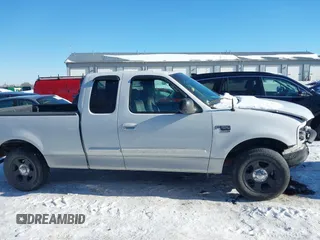 2003 Ford F-150 XL with VIN 2FTRX17W13CA94356, listed as a IAAI auction lot 41346444 with 180,686 mi miles and . Bid and sale history available at DreamBid. Image 13.