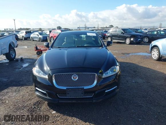2015 Jaguar XJ with VIN SAJWA1CZ2F8V84677, listed as a IAAI auction lot 41723372 with 52,888 mi miles. Bid and sale history available at carsss.com. Image 12.
