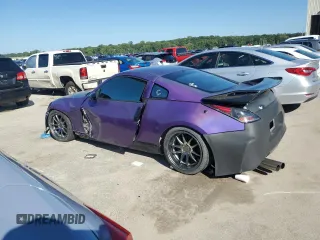 2005 Nissan 350Z with VIN JN1AZ34D05M608841, listed as a Copart auction lot 70408954 with 226,812 mi miles and Salvage Title. Bid and sale history available at DreamBid. Image 2.