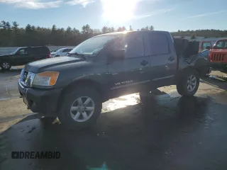 2012 Nissan Titan SV with VIN 1N6AA0EC9CN309653, listed as a Copart auction lot 85944054 with 146,956 mi miles and Salvage Title. Bid and sale history available at carsss.com. Image 1.