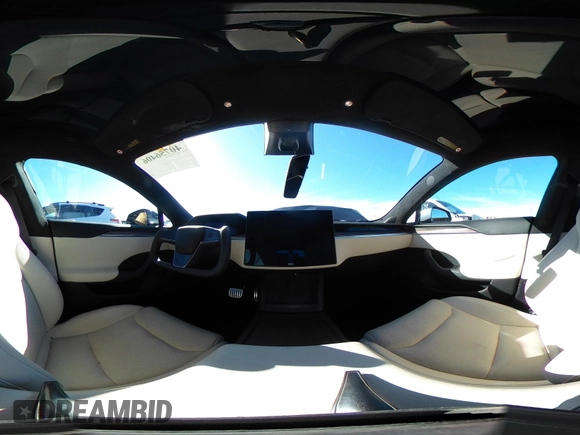 2023 Tesla Model S with VIN 5YJSA1E5XPF500341, listed as a IAAI auction lot 40756406 with 11,583 mi miles and . Bid and sale history available at DreamBid. Image 21.