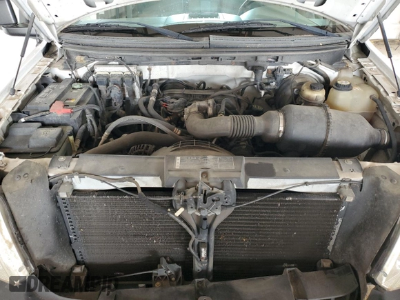 2007 Ford F-150 XL with VIN 1FTRF12297NA82401, listed as a Copart auction lot 58295705 with 198,470 mi miles and Salvage title. Bid and sale history available at DreamBid. Image 11.
