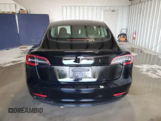 2023 Tesla Model 3 z VIN 5YJ3E1EA1PF450693, wystawiony jako Copart lot #63134005 z przebiegiem 65 116 mil mil oraz Czysty tytuł • Clean title. Historia ofert i sprzedaży dostępna na DreamBid. Obrazek 6.