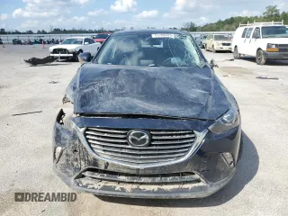 2018 Mazda CX-3 Grand Touring z VIN JM1DKFD79J0329416, wystawiony jako Copart lot #51708325 z przebiegiem 64 597 mil mil oraz Szkody całkowita. Historia ofert i sprzedaży dostępna na DreamBid. Obrazek 5.