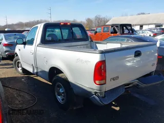 2002 Ford F-150 XL with VIN 1FTRF17222NC00760, listed as a IAAI auction lot 41653940 with 314,637 mi miles. Bid and sale history available at carsss.com. Image 3.
