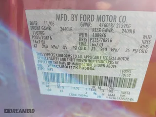 2007 Ford Escape Hybrid with VIN 1FMCU59H17KB95964, listed as a IAAI auction lot 41651728 with 198,371 mi miles. Bid and sale history available at carsss.com. Image 9.