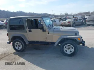 2006 Jeep Wrangler Sport Right Hand Drive with VIN 1J4F449S46P716520, listed as a IAAI auction lot 41763887 with 236,816 mi miles. Bid and sale history available at carsss.com. Image 13.