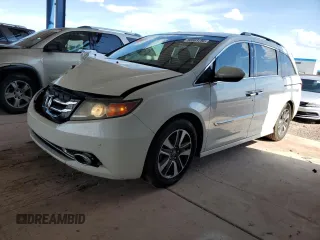 2015 Honda Odyssey Touring Elite with VIN 5FNRL5H90FB117781, listed as a Copart auction lot 56003795 with 144,277 mi miles and Salvage title. Bid and sale history available at DreamBid. Image 1.