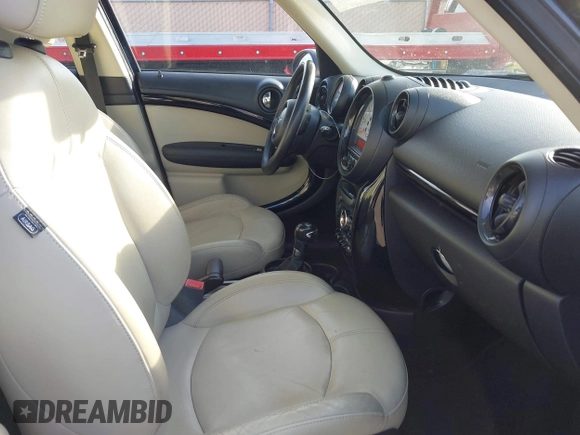 2014 MINI Countryman with VIN WMWZB3C50EWR42268, listed as a IAAI auction lot 41845750 with 117,192 mi miles and . Bid and sale history available at DreamBid. Image 5.