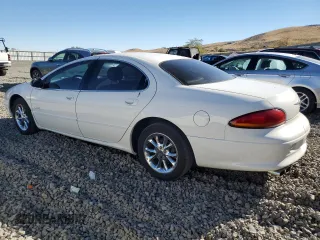 2001 Chrysler LHS z VIN 2C3AC56GX1H547856, wystawiony jako Copart lot #77842124 z przebiegiem 97 378 mil mil oraz Tytuł czysty. Historia ofert i sprzedaży dostępna na DreamBid. Obrazek 2.