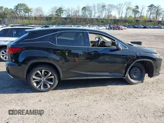 2019 Lexus RX with VIN 2T2BZMCA3KC193615, listed as a IAAI auction lot 42097232 with 33,797 mi miles. Bid and sale history available at carsss.com. Image 13.