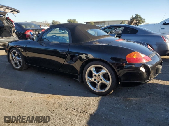 2000 Porsche Boxster z VIN WP0CA2983YU621686, wystawiony jako Copart lot #88951585 z przebiegiem 127 276 mil mil oraz Tytuł czysty. Historia ofert i sprzedaży dostępna na DreamBid. Obrazek 2.