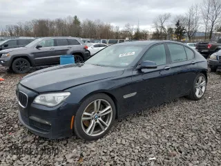 2015 BMW 7 Series 750i xDrive with VIN WBAYB6C56FD965841, listed as a Copart auction lot 48748145 with 102,305 mi miles and Salvage Title. Bid and sale history available at carsss.com. Image 1.