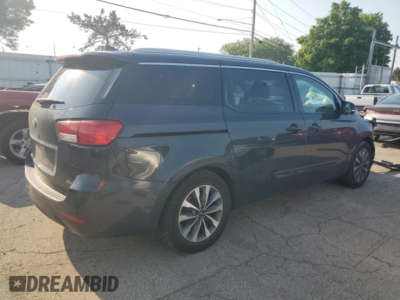 2015 Kia Sedona SX with VIN KNDMC5C10F6047335, listed as a Copart auction lot 66235414 with 154,460 mi miles and Salvage Title. Bid and sale history available at DreamBid. Image 3.