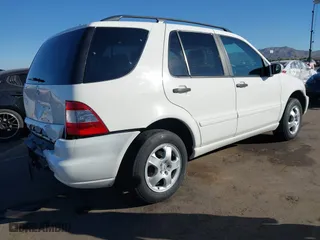 2004 Mercedes-Benz M-Class 3.5L with VIN 4JGAB57E54A482716, listed as a IAAI auction lot 40731487 with 178,587 mi miles. Bid and sale history available at carsss.com. Image 4.