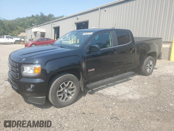 2018 GMC Canyon 4WD All Terrain w/Cloth with VIN 1GTG6CEN0J1301365, listed as a Copart auction lot 69886294 with 61,857 mi miles and Salvage Title. Bid and sale history available at carsss.com. Image 1.