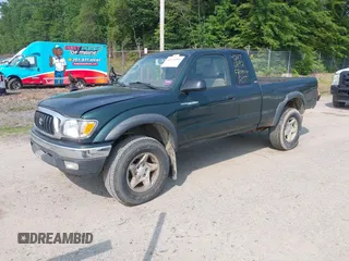 2002 Toyota Tacoma with VIN 5TEWM72NX2Z097369, listed as a IAAI auction lot 42476892 with 90,855 mi miles and . Bid and sale history available at DreamBid. Image 2.