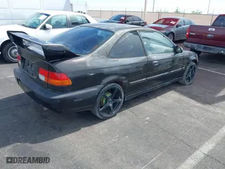 1997 Honda Civic EX with VIN 1HGEJ8243VL096134, listed as a IAAI auction lot 41929243 with 206,195 mi miles. Bid and sale history available at carsss.com. Image 4.