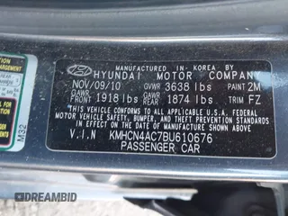 2011 Hyundai Accent GLS with VIN KMHCN4AC7BU610676, listed as a IAAI auction lot 42051520 with 165,902 mi miles. Bid and sale history available at carsss.com. Image 9.
