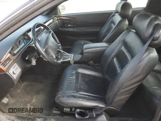 1999 Cadillac Eldorado Touring z VIN 1G6ET1298XU602343, wystawiony jako Copart lot #44327195 z przebiegiem 52 327 mil mil oraz Szkody całkowita. Historia ofert i sprzedaży dostępna na DreamBid. Obrazek 7.