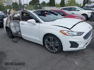 2019 Ford Fusion Titanium with VIN 3FA6P0D94KR143184, listed as a IAAI auction lot 42094385 with Not provided miles and . Bid and sale history available at DreamBid. Image 1.