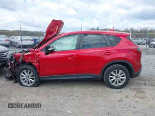 2015 Mazda CX-5 Touring with VIN JM3KE4CY7F0492559, listed as a IAAI auction lot 42053447 with 95,675 mi miles. Bid and sale history available at carsss.com. Image 14.