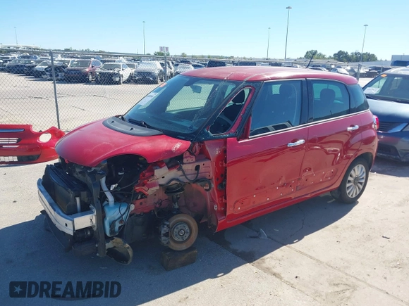 2014 FIAT 500L Easy with VIN ZFBCFABH7EZ027657, listed as a IAAI auction lot 40808990 with 107,591 mi miles and . Bid and sale history available at DreamBid. Image 2.