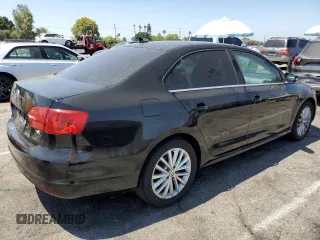 2014 Volkswagen Jetta TDI w/Premium with VIN 3VWLL7AJ8EM367587, listed as a Copart auction lot 63670815 with 129,289 mi miles and Clean title. Bid and sale history available at DreamBid. Image 3.