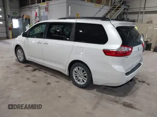 2015 Toyota Sienna XLE with VIN 5TDYK3DC8FS598525, listed as a IAAI auction lot 41918825 with 128,557 mi miles. Bid and sale history available at carsss.com. Image 3.