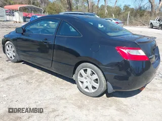 2009 Honda Civic Cpe LX with VIN 2HGFG12669H509744, listed as a IAAI auction lot 41777731 with 202,530 mi miles. Bid and sale history available at carsss.com. Image 3.