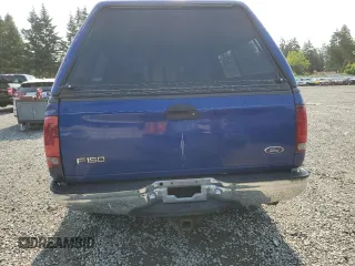 1998 Ford F-150 with VIN 1FTZX1765WKA33379, listed as a Copart auction lot 62009135 with 152,607 mi miles and Salvage title. Bid and sale history available at DreamBid. Image 6.
